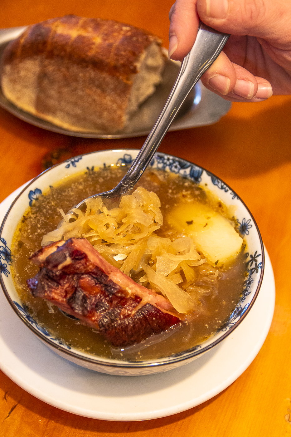 Traditional Polish sauerkraut soup with smoked rib meat at U Gazdy Restaurant in Wood Dale, IL.